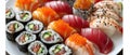 Assorted Sushi Rolls And Traditional Nigiri Platter With Raw Fish Slices Royalty Free Stock Photo