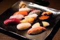 Assorted sushi set served on black tray Royalty Free Stock Photo