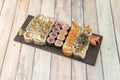 Assorted sushi tray with uramaki california roll with masago roe, wegian salmon Royalty Free Stock Photo