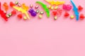 Assorted sweets and marmalade on pink background top view space for text Royalty Free Stock Photo