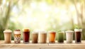 Assorted tapioca bubble teas on blurred coffee shop background with space for text placement