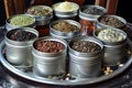 assorted tea blends in tins presented on a platter