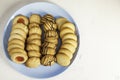 Assorted tea pastes on a blue plate from above