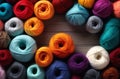 Assorted threads of colorful yarn on wooden background Royalty Free Stock Photo