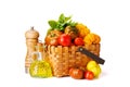 Assorted tomatoes in rustic basket