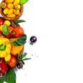 Assorted tomatoes and vegetables isolated on white background. Photo for your design Royalty Free Stock Photo