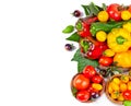 Assorted tomatoes and vegetables isolated on white background. Photo for your design Royalty Free Stock Photo