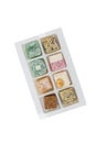 Assorted Turkish delight in a plastic box isolated on a white background Royalty Free Stock Photo