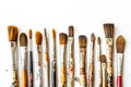 Assorted Used Paint Brushes on White Background Royalty Free Stock Photo