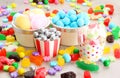 Assorted variety of sweet sugar candies includes bonbons, gummy bears, gum balls and sugar fruit slices Royalty Free Stock Photo