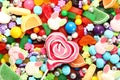 Assorted variety of sweet sugar candies includes lollipops, Easter bunny jelly, gummy bears, gum balls and sugar fruit slices Royalty Free Stock Photo