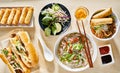 Assorted vietnamese dishes with pho, bahn mi, spring rolls Royalty Free Stock Photo