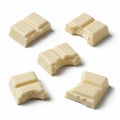Assorted white chocolate pieces displayed on a white background Royalty Free Stock Photo