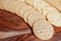 Assorted Whole Grain and Herb Crackers on a Wooden Cutting Board Royalty Free Stock Photo
