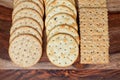 Assorted Whole Grain and Herb Crackers on a Wooden Cutting Board Royalty Free Stock Photo