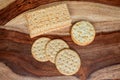 Assorted Whole Grain and Herb Crackers on a Wooden Cutting Board Royalty Free Stock Photo