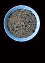 Assorted wild bird food in a dish Royalty Free Stock Photo