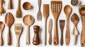 Assorted wooden kitchen utensils on a white background Royalty Free Stock Photo