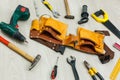 Assorted work tools on wood Royalty Free Stock Photo