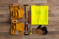 Assorted work tools on wood