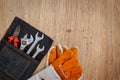 Assorted work tools on wood Royalty Free Stock Photo