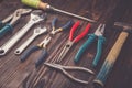 Assorted work tools on wood