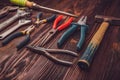 Assorted work tools on wood