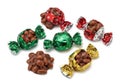 Assorted wrapped chocolates displayed on a white surface. The Royalty Free Stock Photo
