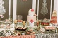 Assortie of the sweets and desserts on the wedding