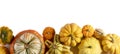 Assortiment of pumpkins on white