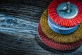 Assortment of abrasive tools on vintage wooden board Royalty Free Stock Photo
