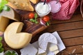 Artisanal dairy products in rustic kitchen top view