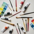 An assortment of artist\'s tools is spread out on a canvas surface. Various Royalty Free Stock Photo