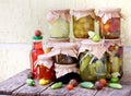 Assortment autumn preserves. Jars of pickled vegetables and jam. Royalty Free Stock Photo