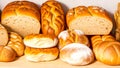 Assortment of baked bread. Loaf of bread with golden crispy crust. Texture bread