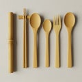 Assortment of bamboo utensils on a textured surface. Includes a Royalty Free Stock Photo