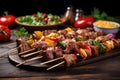 assortment of bbq skewers with meat and vegetables