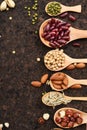 Assortment of beans and lentils in wooden spoon