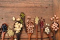 Assortment of beans and lentils in wooden spoon