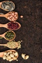 Assortment of beans and lentils in wooden spoon