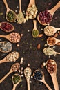 Assortment of beans and lentils in wooden spoon