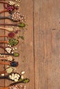 Assortment of beans and lentils in wooden spoon