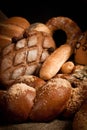 Assortment of bread on sacking Royalty Free Stock Photo
