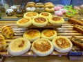 Assortment of breads and donuts for sale at bakeshop