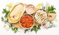 Assortment of canned fish on a white background in tins. Processed food