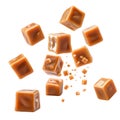 Assortment of caramel candies and small caramel pieces falling candy sweet Royalty Free Stock Photo