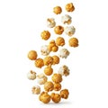 Assortment of caramel and white chocolate coated popcorn pieces falling Royalty Free Stock Photo