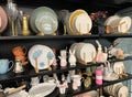 Assortment of ceramic products on the shelf.