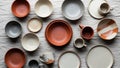 Assortment of ceramic tableware including bowls plates and mugs is Royalty Free Stock Photo
