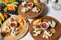 Assortment of cheese with and honey on a stone plate Royalty Free Stock Photo